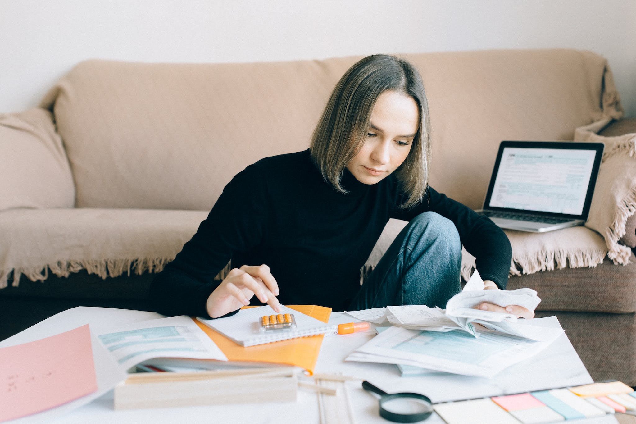 Woman in Black Long Sleeves Shirt Doing Accounting